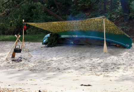 A Ray Mears Super Tarp, a canoe, and a bit of imagination...